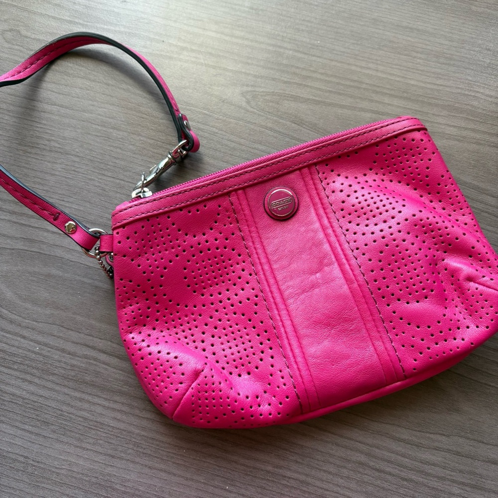 coach | fuchsia pink perforated monogram wristlet bag pouch